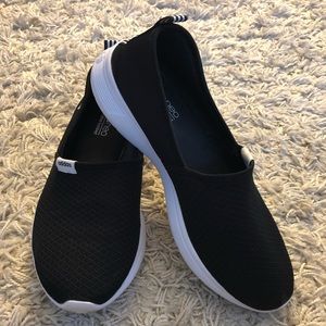 Adidas slip on shoes.